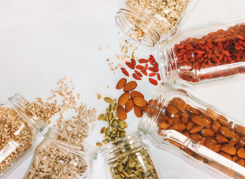 Jars of nuts, seeds and dried fruit rich in zinc